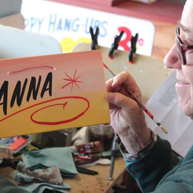 George the Sign Painter with a personalized Anna sign at Shipshewana Flea Market