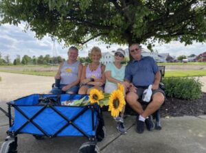 Farmstead Inn grounds couples resting from shopping