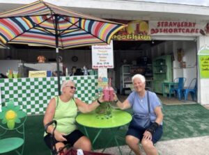 shipshewana flea market shoppers toasting smoothies